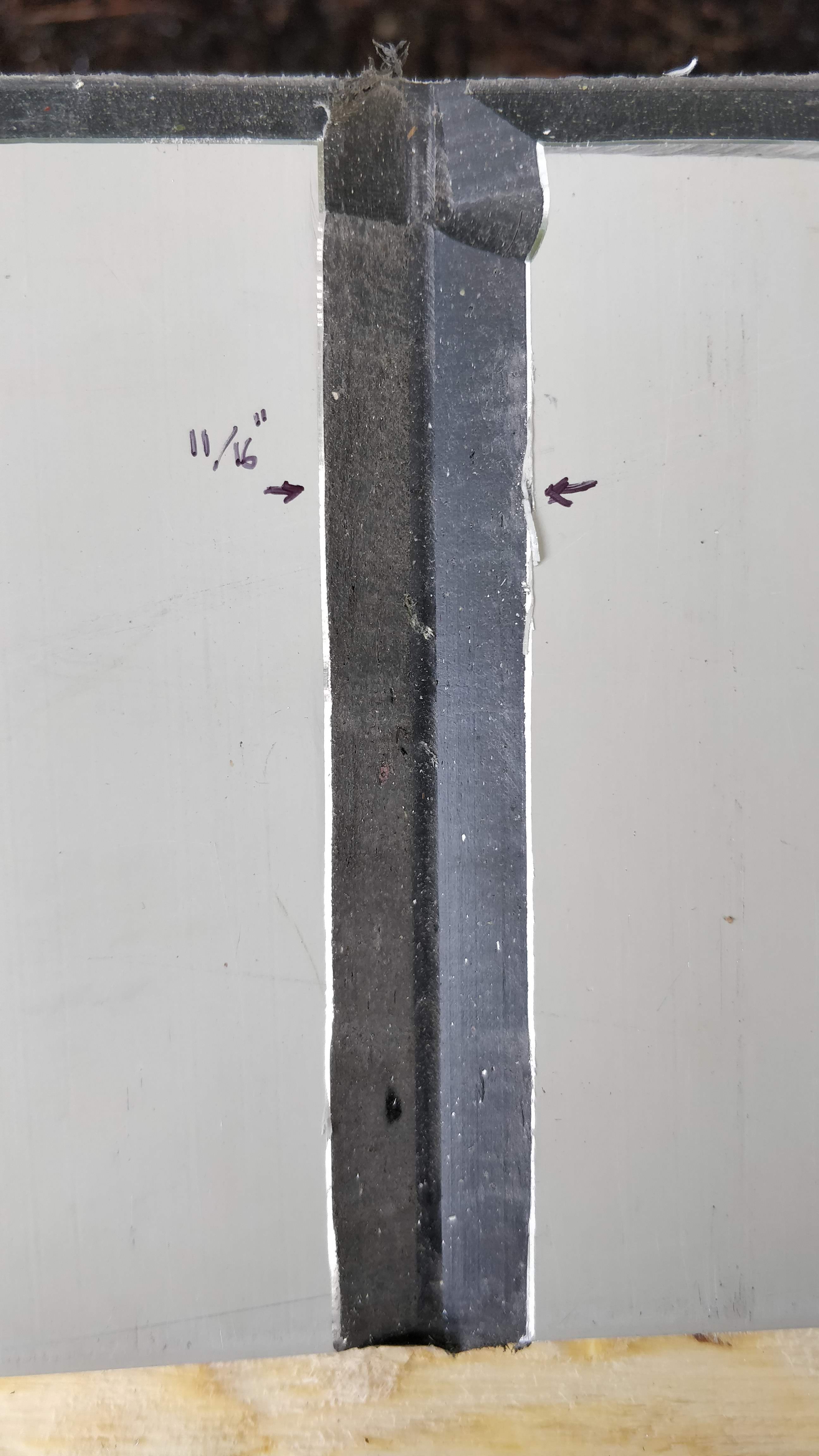 Un-bent test piece with registered measurements